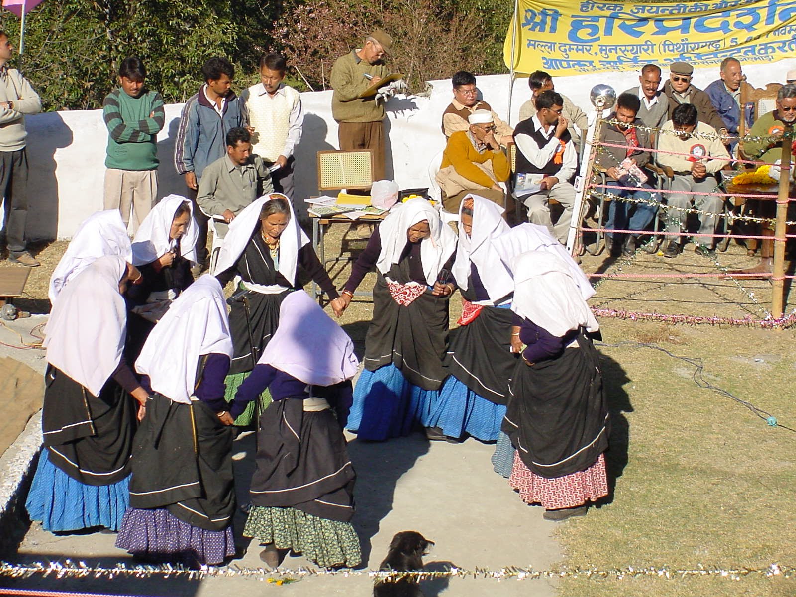 Johari Bhotia women in traditional dress dancing in a circle at a village festival near Munsiyari